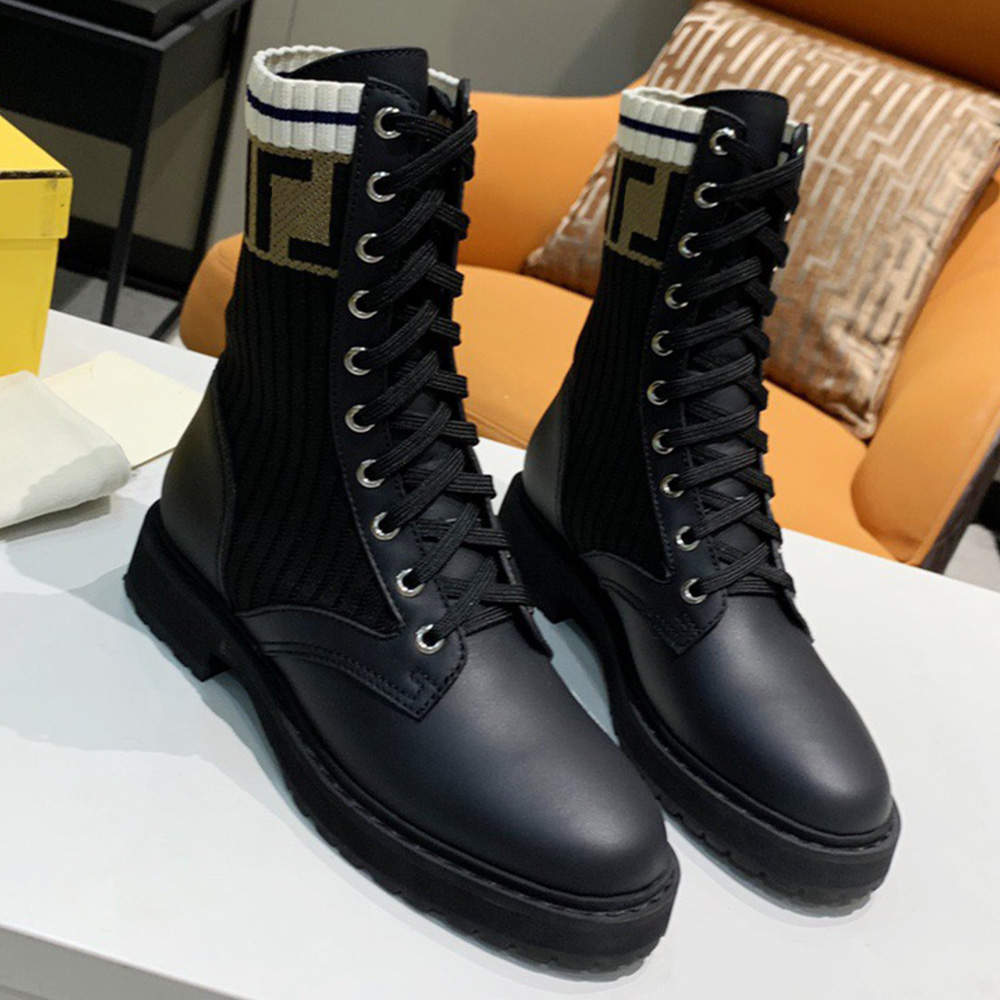 

Rockoko Black leather biker boots with stretch fabric A socklike high top embellished designer ankle boot non slip rubber soles made from black calfskin booties, Shipping supplement