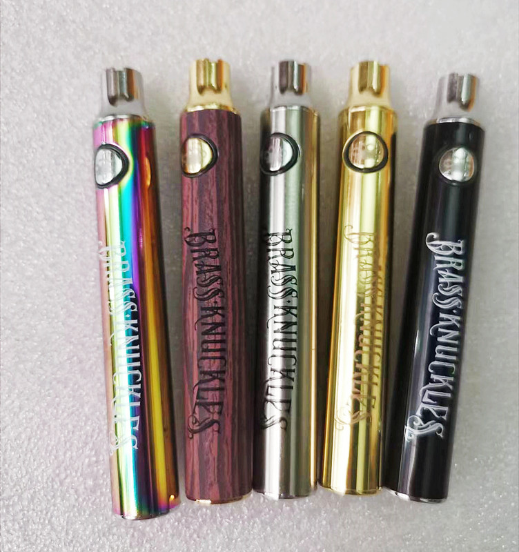 

e cigarette vape brass knuckles battery 510 thread 900mah adjustable voltage 3.2 3.7 4.2v usb charger rainbow black gold silver color clear box packaging custom