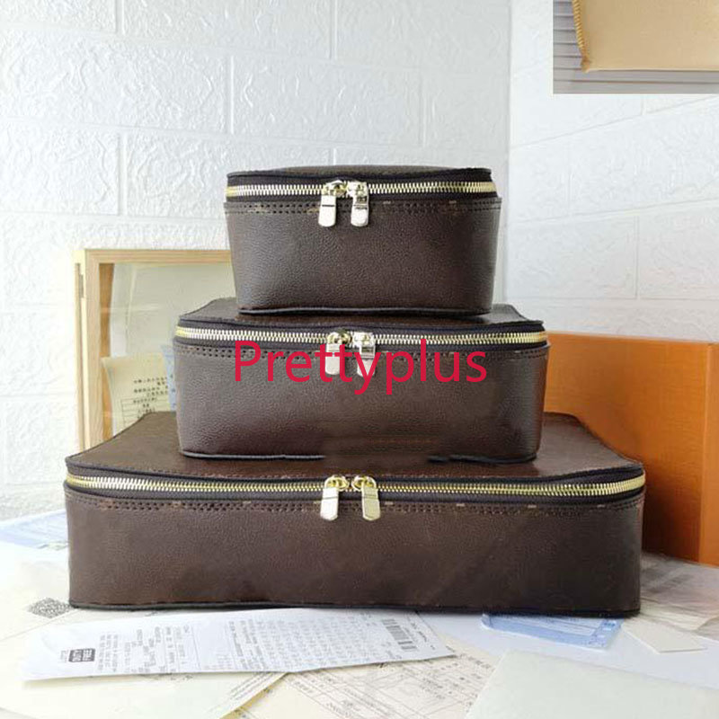 

Fashion M43690 Brown flower Storage box Leather Travel Jewelry boxs New set designers Travel Storage box Luggage Fashion Trunk boxs Suitcases Bags cosmetic bag, 17x9.5x8.5cm