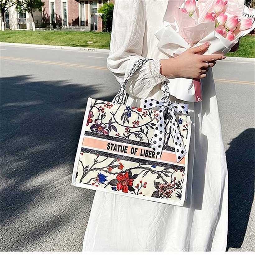 60% de rabais 2023 sacs de créateurs sacs de printemps toile de grande capacité pour les femmes de maquillage pour les femmes de magasin