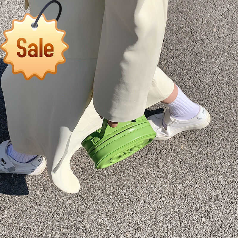 Sacs de créateurs arc de triomphe mini gâteau rond petite femelle nouvelle mode polyvalent msenger moon moon usine de vente directe sac à main da