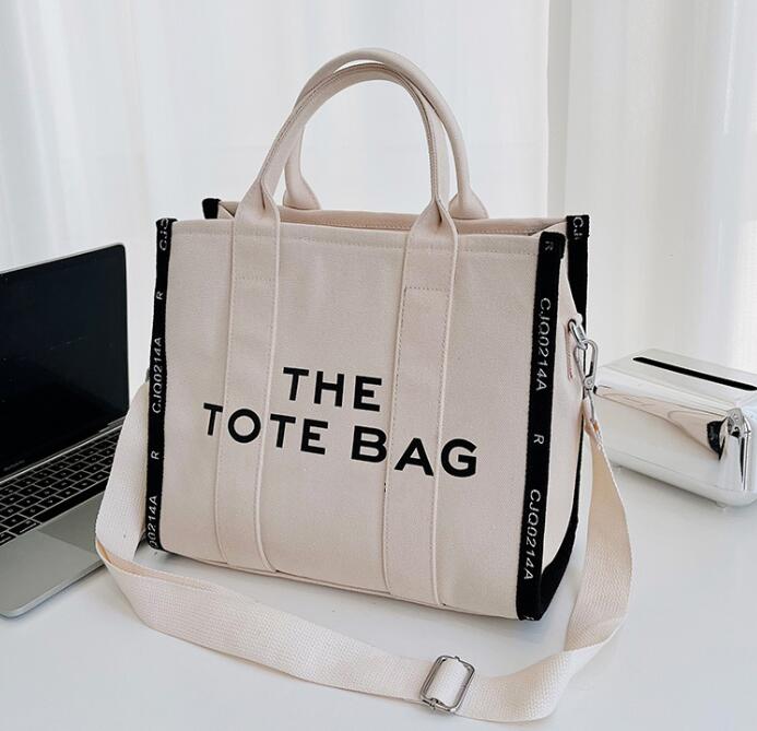 

The Tote Bag Lady Famous Designer Canvas Messenger Shopping Bags Cross body Shoulder Bags Handbags Women Totes purse Wallets plain with logo patch on back, White