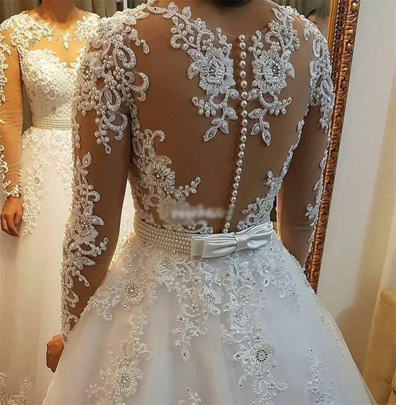 Court Train Robe De Mariée Fantaisie Bijoux Cou Manches Longues En Dentelle Applique Corsage Dos Ouvert Voir À Travers Sexy Robes De Mariée Robe