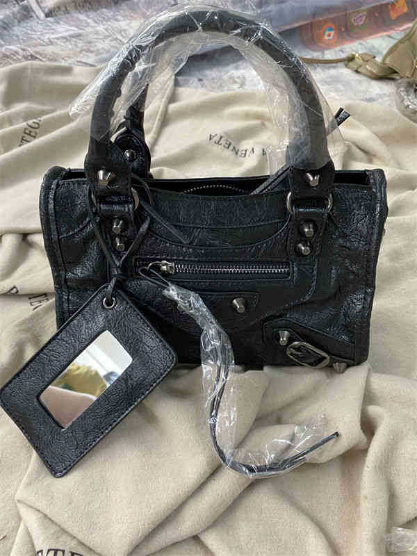 

designer Luxurious Balenicagas bag fashion women's bag rivet tassel Mini locomotive single shoulder Crossbody Bag Hand AJL2 Balencaigaity MYHM, No bag