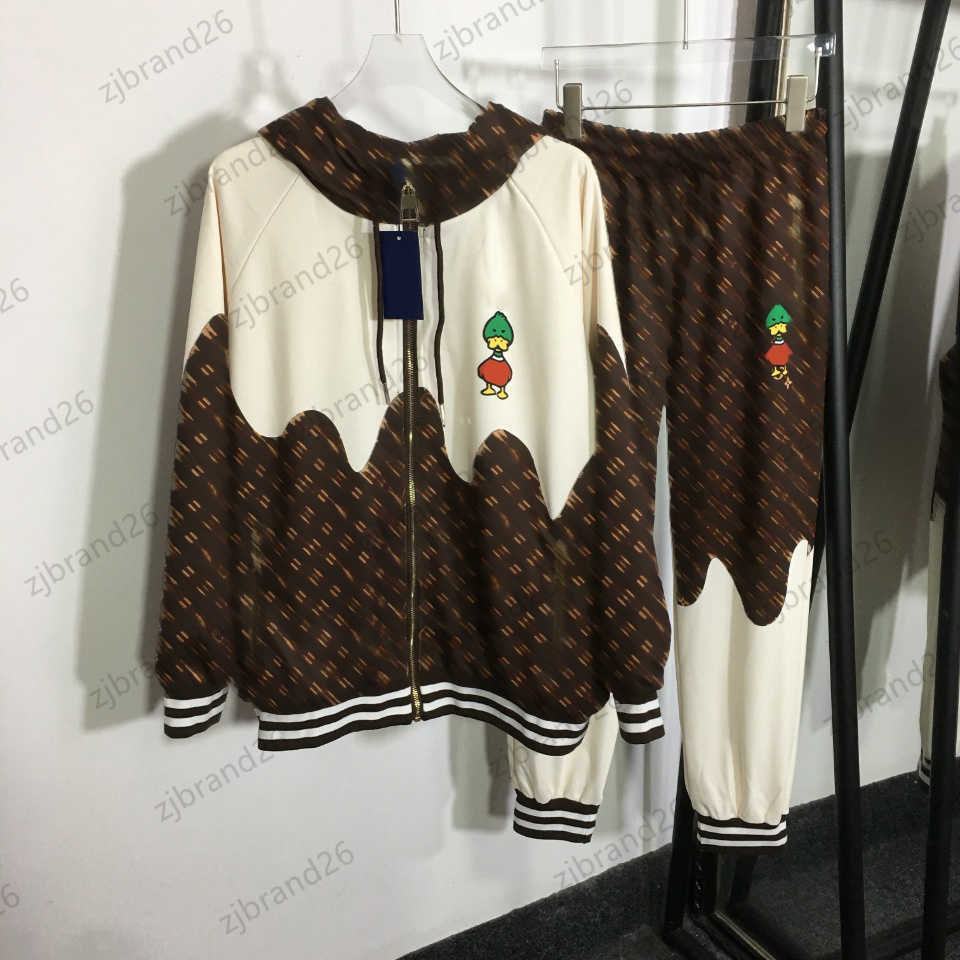 

Womens Two Piece Pants Irregular Patchwork Cartoon Print Hooded Jacket Tops Elastic Waist Loose Tie Feet Trousers Cute Sports Style Women Clothes