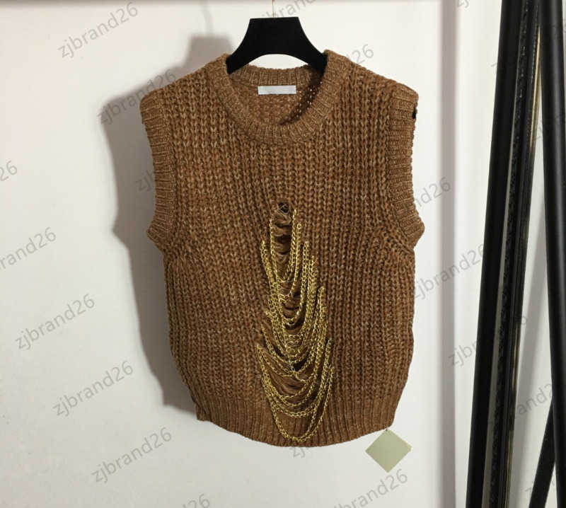 

Designer Womens Sweaters Round Neck Pullover Sleeveless Knit Sweater Tops Metal Chain Hole Decoration Short Slim Vest Fashion Design Sense Trend Women Wears 1970