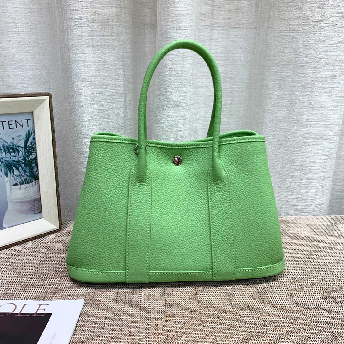 

Luxurious Designer Herme bags 2022 new garden Baotou layer cowhide lychee pattern women's wide shoulder strap hand women, Orange