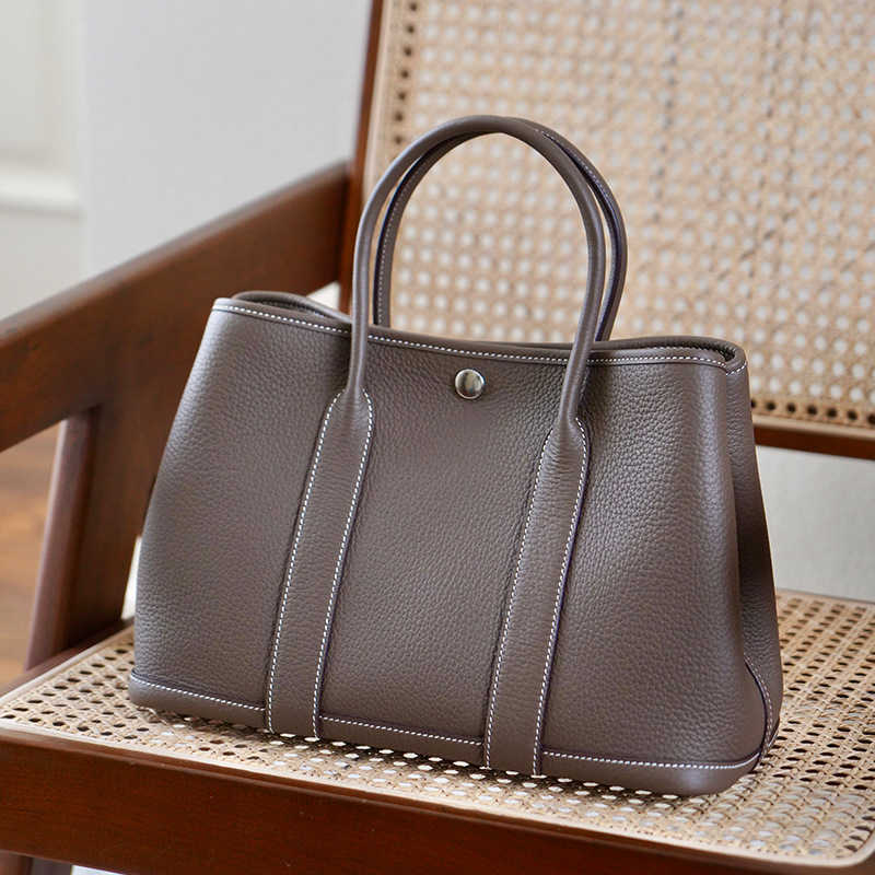 

Luxurious Designer Herme bags High end production 2022 new leather women's single shoulder cross tot versatile hand garden, Black