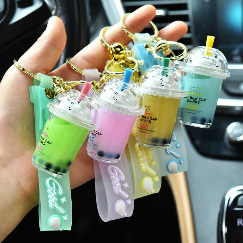 

Keychains Cute Cat Pearl Milk Tea Cup Key Chain Creative Quicksand Liquid Floating Drink Keyring Backpack Pendant Keychain Gift for Women G221026