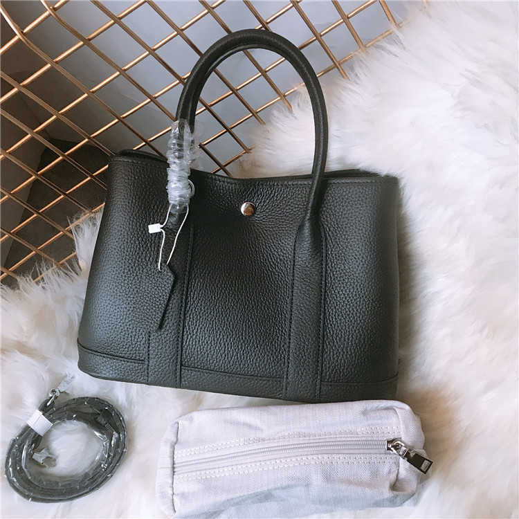 

Luxurious Designer Herme bags Leather women's garden lychee grain leather with adjustable shoulder strap, Red