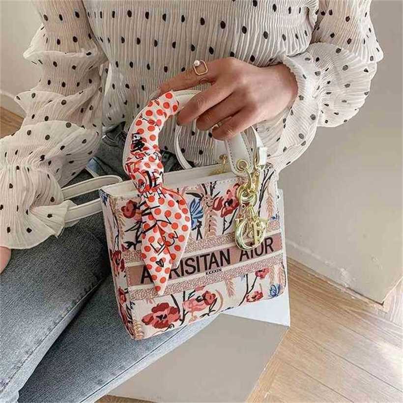 

60% OFF 2023 Designer bag bags This year's popular letter handbag color printed single MessengerE75E, White