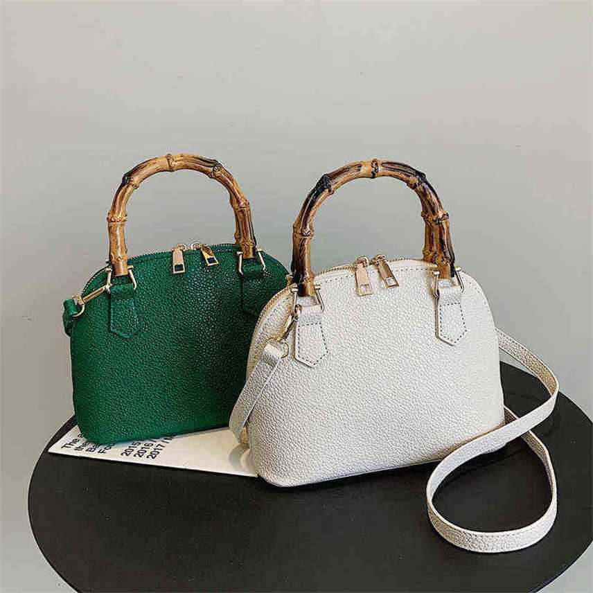 

Small bag 2022 new women's versatile hand one shoulder messenger shell hands Purses, White