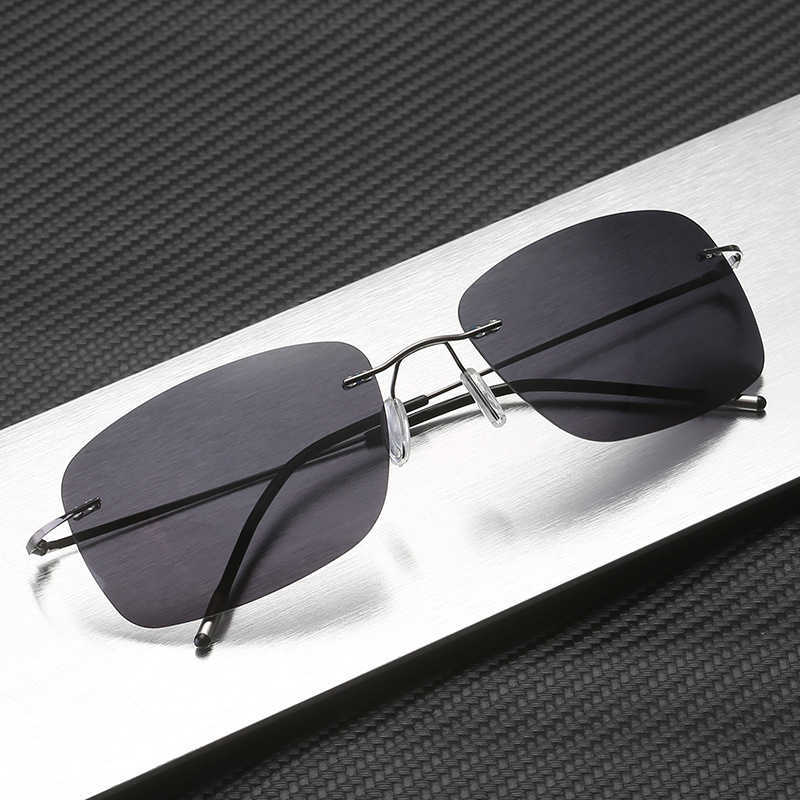 

Sunglass box folding ultra light titanium polarized anti ultraviolet Sunglasses men s and women s frameless driving