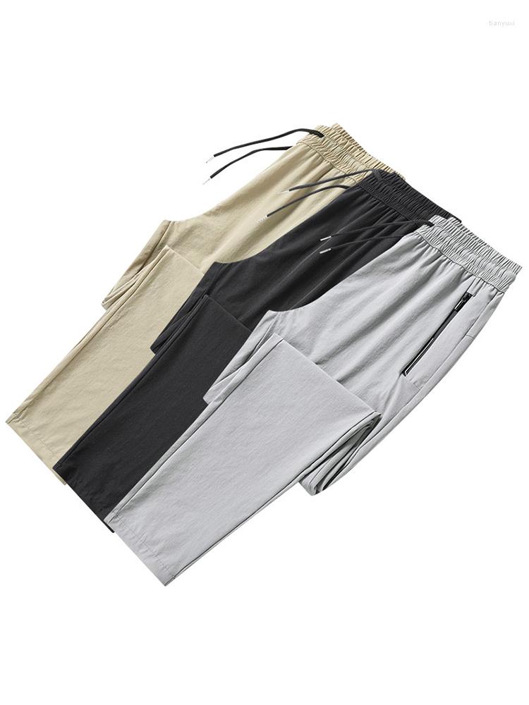 

Men's Pants 2022 Large Size 6XL Men's Summer Big Ice Silk Sports Long Loose Casual Lightweight Male Track Black Trousers