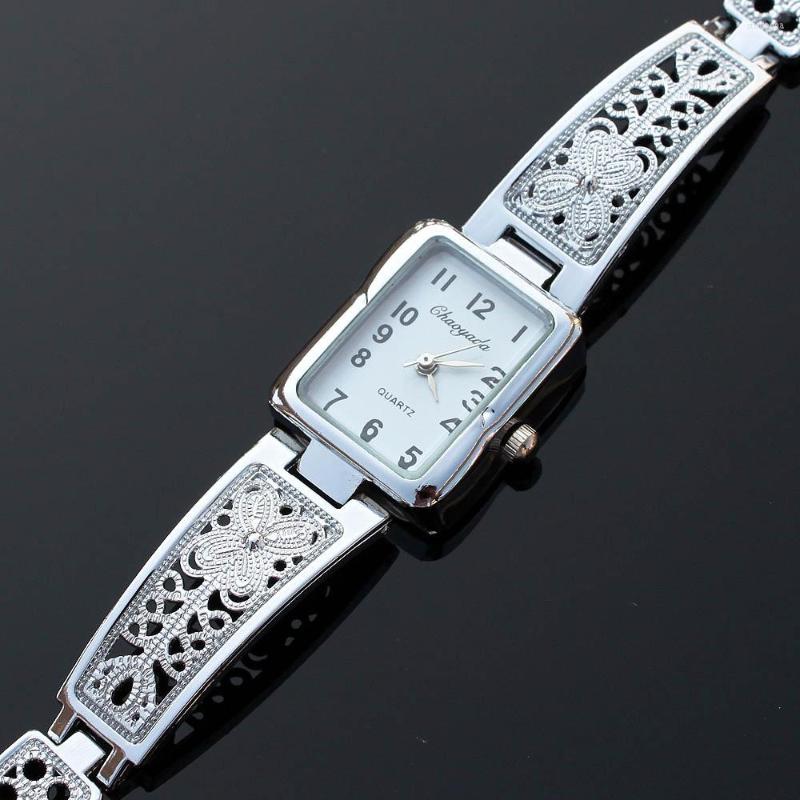 

Wristwatches Fashion Butterfly Women Dress Hollow Strap Casual Ladies Bracelet Quartz Watches Wrist Watch O35S, O35s white