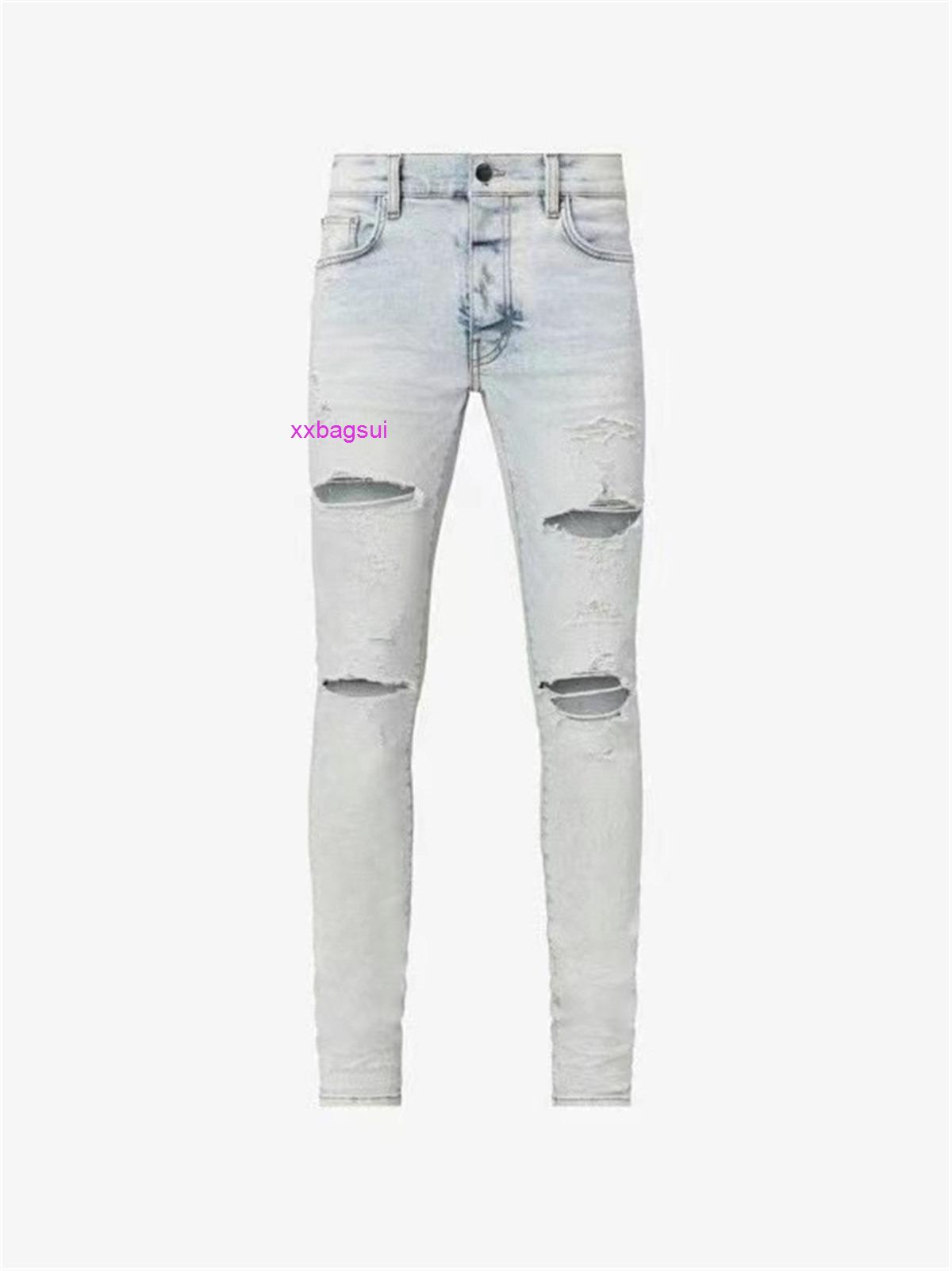 

designer amirs jeans for mens style light blue knee hole big damage elastic slim fit accumulation high street SLP jeans brand