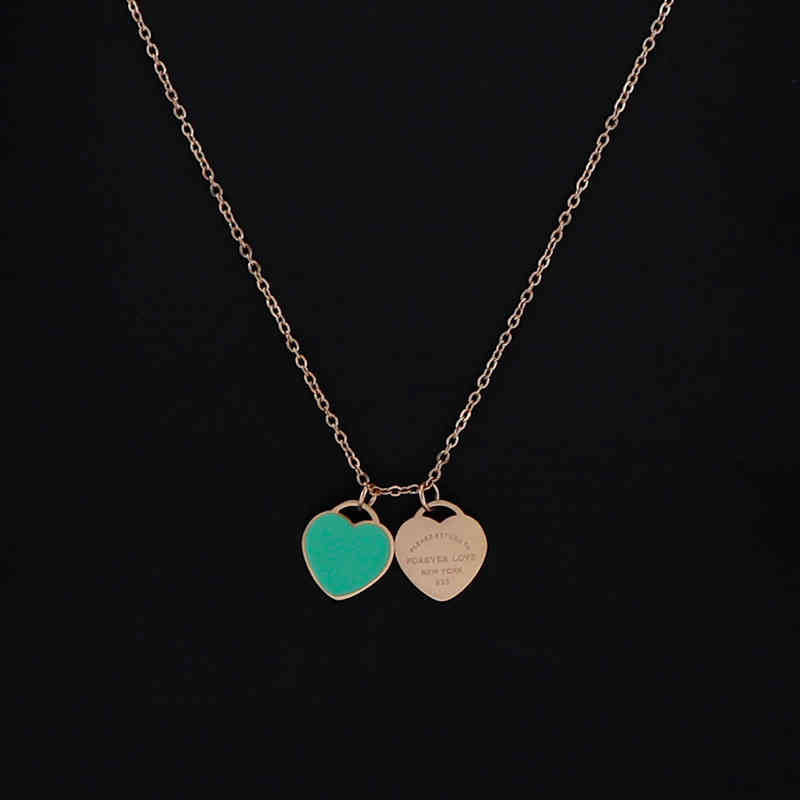 

Net red titanium steel Korean style temperament glue drop double love letter necklace ins high class small heart clavicle chain