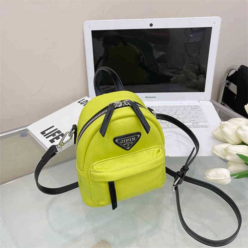 

Bags New versatile Shoulder Bag Mini double shoulder white women's bag triangle mark color portable Purses