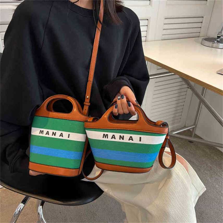 

Bags 2022 new straw woven mani canvas color painting splicing Pu sling single shoulder diagonal straddle portable vegetable basket bag beach Purses, Horizontal brown
