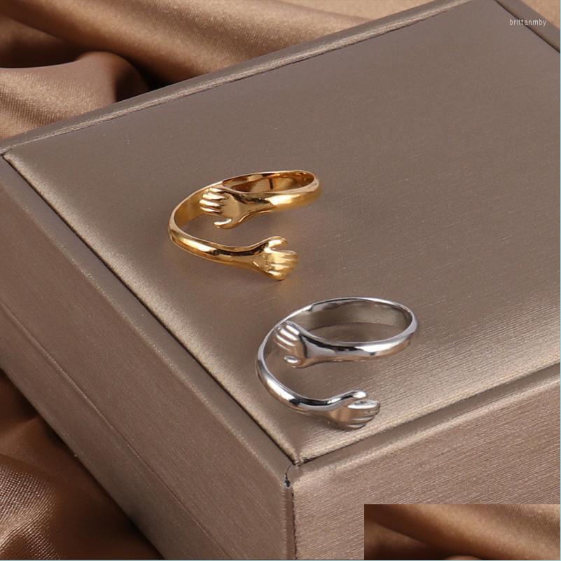 

Cluster Rings Cluster Rings Stainless Steel Hug Ring For Women Ins Romantic Love Carved Hand Men Fashion Adjustable Jewelry Punk Sna Dhe9O