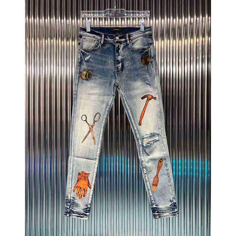 

American print Fit and amirly fashion brand washed blue new hole fashion versatile Slim high-end European Jeans Men