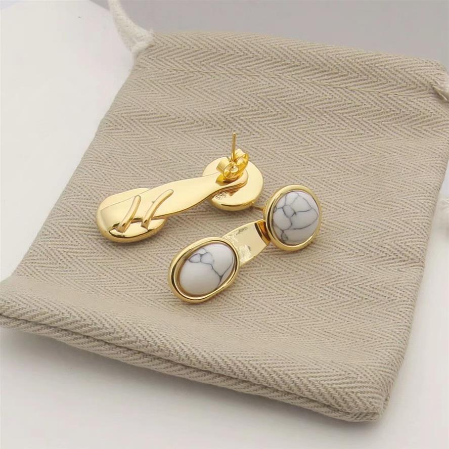 

Fashion Jewelry Women Gold Earrings Turquoise Stud with diamond And Letters Stainless Steel Silver plated Four leaf Flower Pattern299z