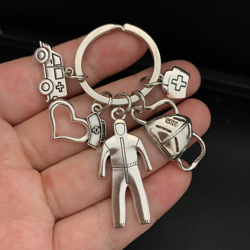 

New Nurse Medical Box Medical Key Chain Mask Needle Syringe Stethoscope Cute Angel Spin Keychain Take Care of Yourself Key Ring