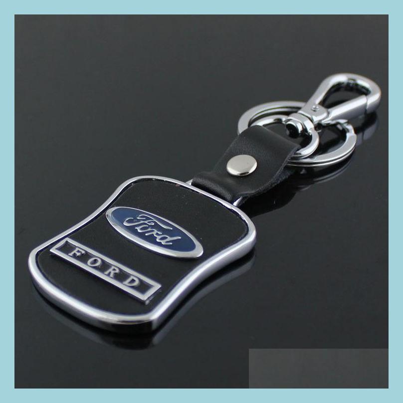 

Car Key 5Pcs/Lot Leather Car Keychain Logo Key Ring Curved Shape Components Fashion Mens Waist Chain For Ford Focus 2 3 Chaveiro Dro Dhw1P, See pic