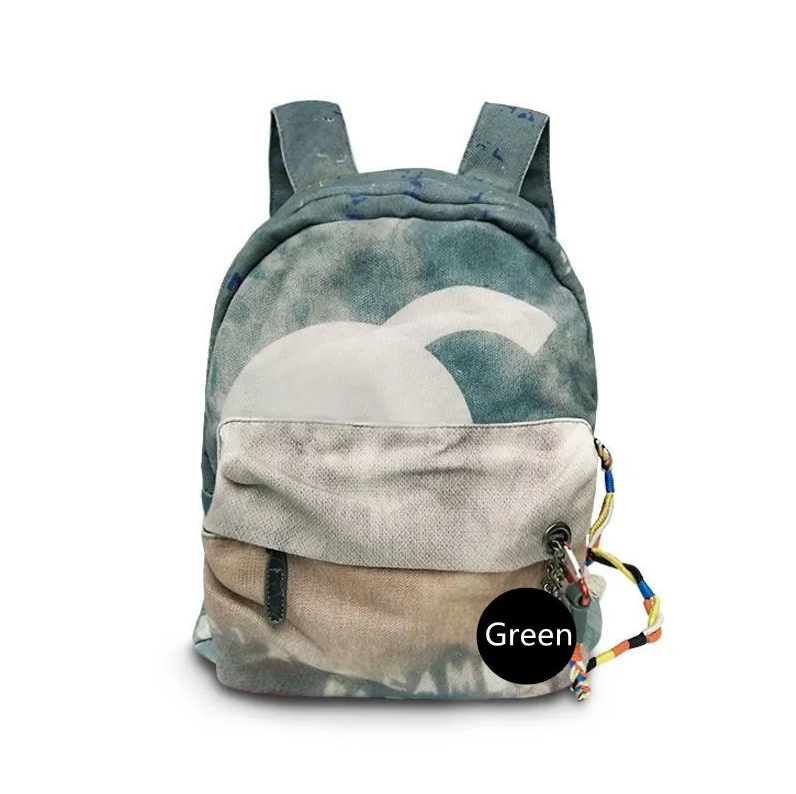 Designer bags 2026 Fashion brand women men book tote bag lady Graffiti canvas backpack handbags purse designer handbag women travel beach Bags rider