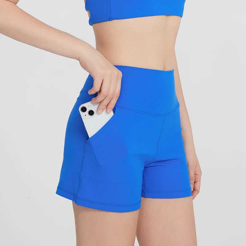 Jogging Sports Shorts Couleurs massives Shorts de fitness à taille haute course Base de cyclisme portant un short à trois pots avec PocketxJ25091