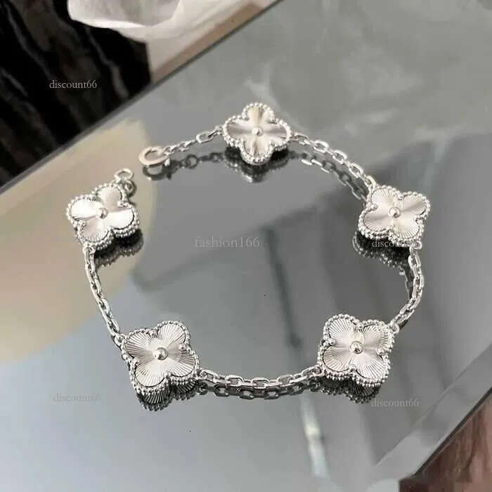 Bracelet de trèfle à quatre feuilles Natural Shell Gemstone Gold plaqué concepteur pour femme T0p Qualité de qualité Reproductions Fashion Brand