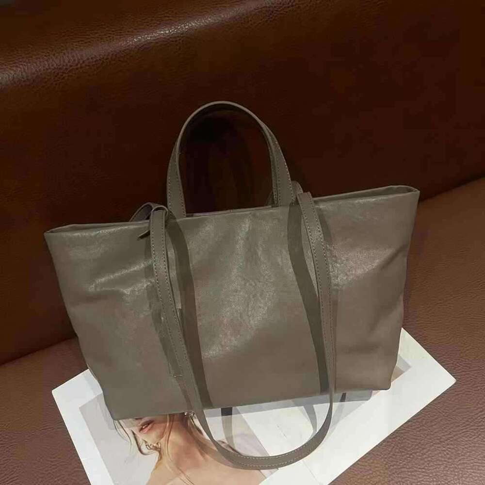 Sac de créateur sac fourre-tout sac à bandoulière guangzhou body body de grande capacité nouveau de la femme en cuir en cuir véritable sans épaul