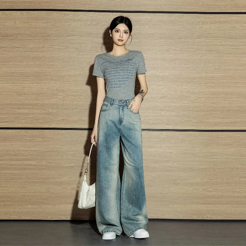 Jeans à la jambe large et à taille haute rétro pantalon de la longueur de plancher coupé droit à l'ourlet en liberté pantalon 250919