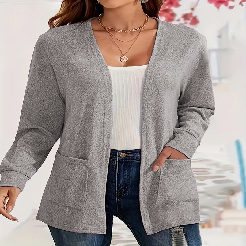 Autumn and winter European American foreign trade thin fashion solid color pocket knitted womens buttonless cardigan 250919