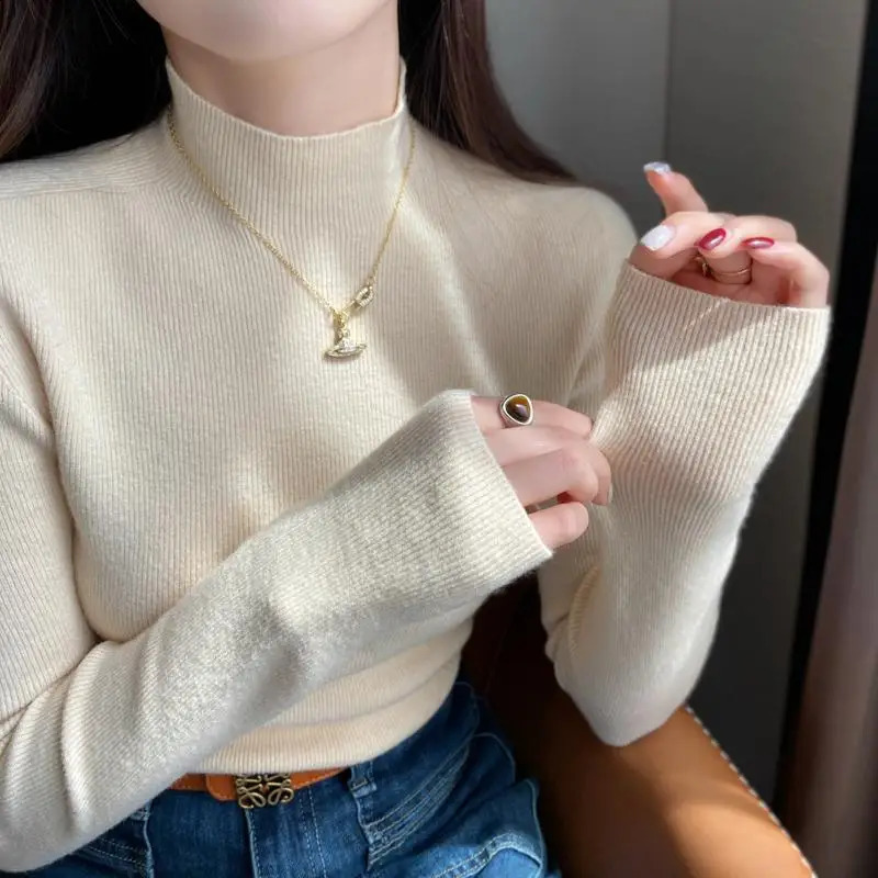 Pull à col roulé de couleur unie en tricotée 2025 Slim à manches longues Base Femme Pullover polyvalent automne d'hiver