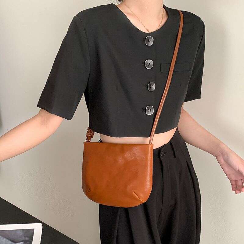Spring-Summer 2025 New Style Vegetable Leather Saddle Niche Sac, cuir authentique minimaliste, petite, pour les femmes à la mode polyvalente
