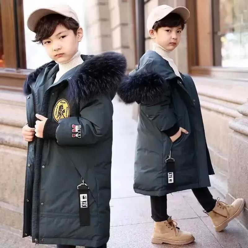 Nouvelle veste de garçons d'hiver adolescente plus en velours épaississant des enfants en coton à capuche épaissis les vestes longues 414y x25092