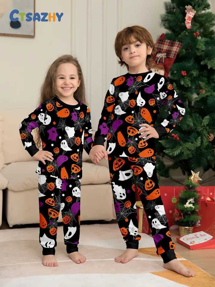 Ensemble de pyjama d'Halloween pour enfants correspondant à un pyjama noir avec Jack O Lantern Ghost Spider Web Prints x250920