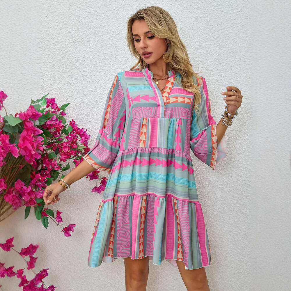 2025 Vêtements féminins Station indépendante Nouveau European American Spring automne imprimé en V Col à trois quarts Robe à manches à la mode et