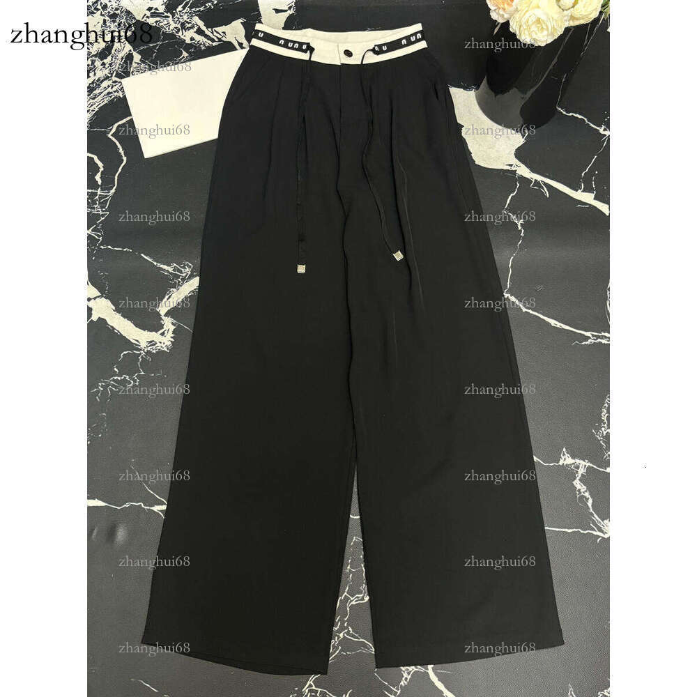 Pantalon de créateur de mode pour femmes décontracté polyvalent en ligne noir et blanc avec ceinture et lettre imprimée conception adaptée aux vê