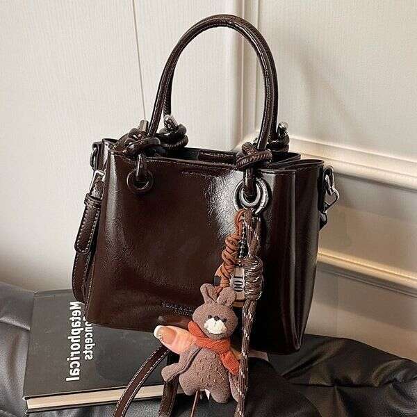 Pendentif garçon portable de petit carré mignon mignon pour les femmes à la mode à épaule unique sac à bandoulière à la mode printemps été