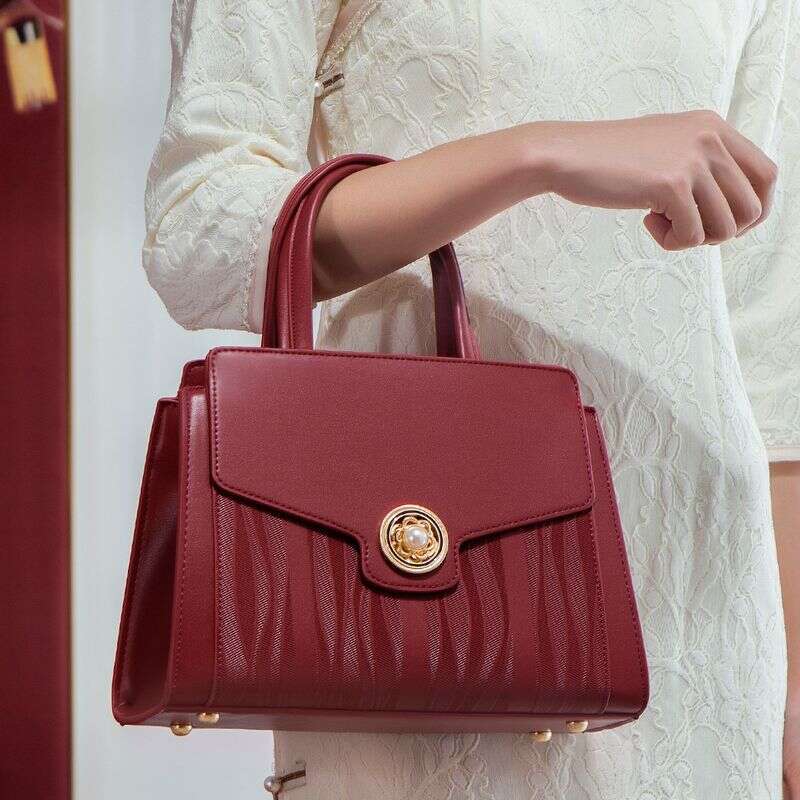 Mariée haut de gamme pour les femmes élégant sac de mariage niche enveloppe rouge sac à main 2024 nouveau modèle