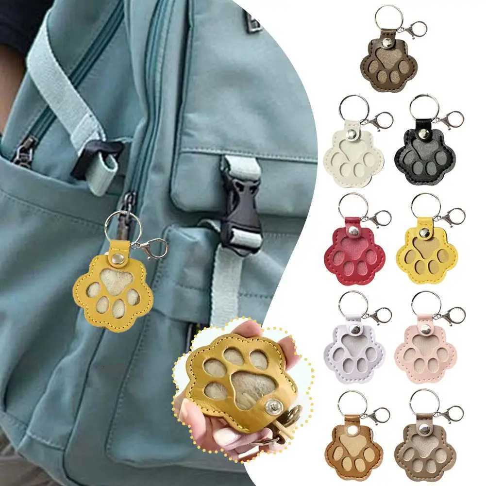 1PC PAW FORME MEMORIAL PU Le cuir Pet Pet Rangement Sac de rangement mignon PAW Cat chien fourrure Keychain Pendant Accessoires portables portabl