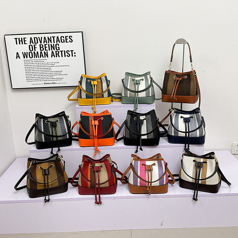 Top Brand High Quality New Style Free Delivery Designer Bag Color Striped Bag 2025 Cross-Border New Drawstring Style Trendy Bucket Bag New Free Deli