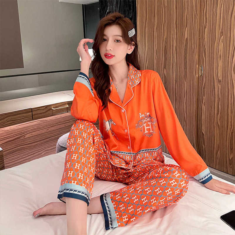 Pyjamas de soie glaciaire de créateurs de somnifères pour femmes pour femmes à manches longues et pantalons longs minces et haut de gamme