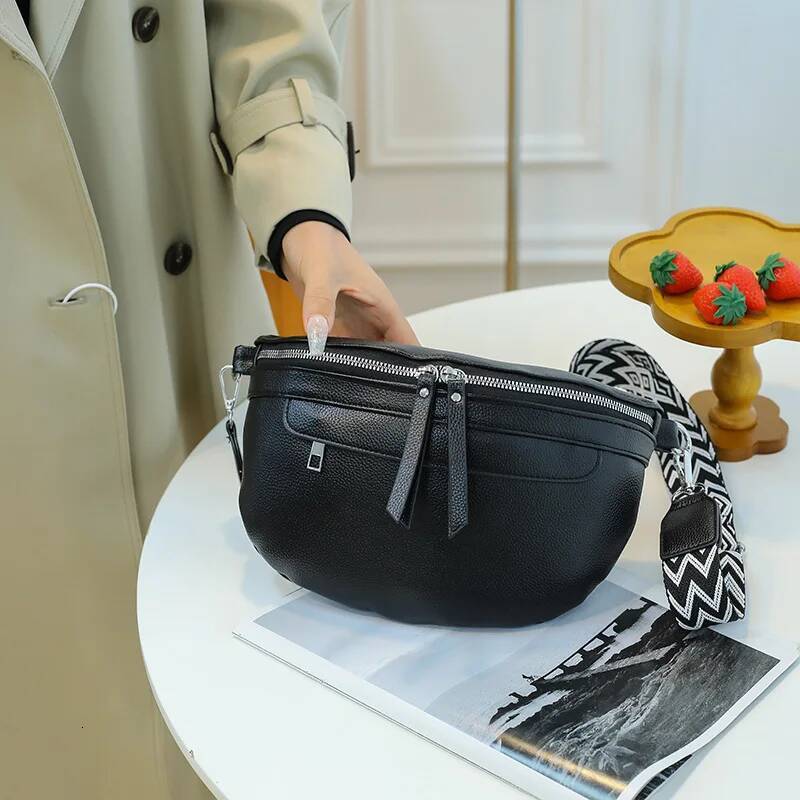 Tilorraine Trendy, simple and fashionable black PU chest single shoulder large capacity saddle bag
