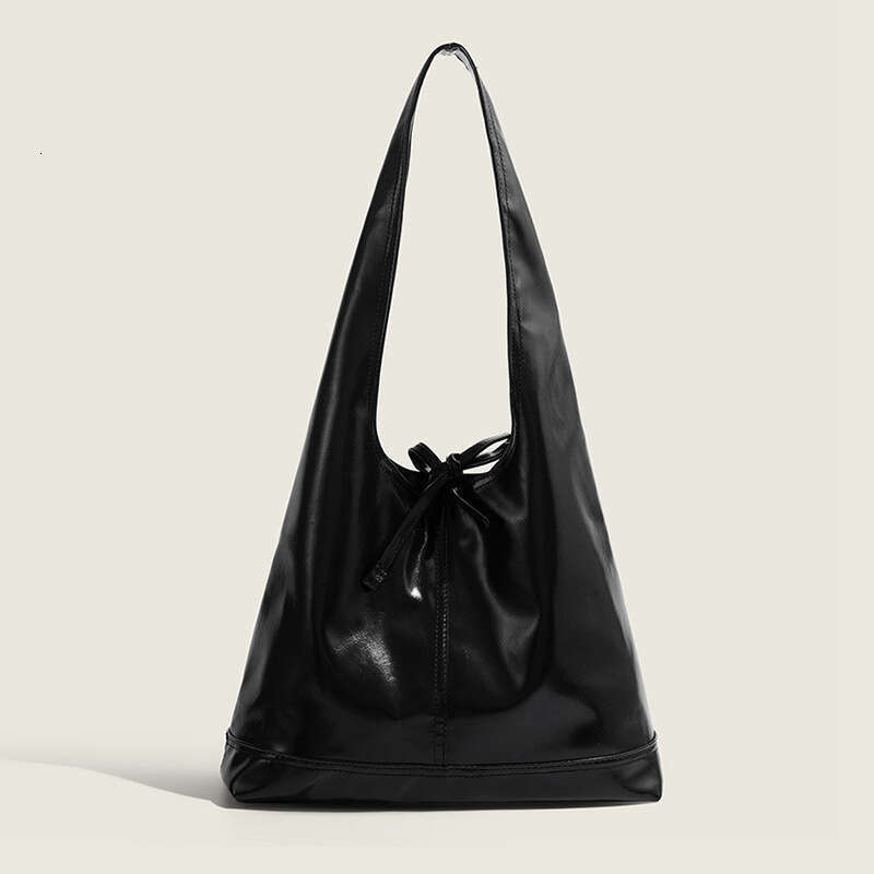 coréen banlieue grande capacité simple épaule femmes, sac fourre-tout à nœud papillon de niche noire, nouveau sac sous les bras décontracté pour