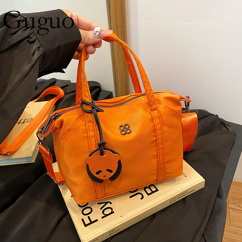 Guguo Livraison gratuite Nouveau sac de créateur 2024 Automne Hiver New Oxford Tissu Sac Femme Sac Dumpling Sac à main Simple Sac à main