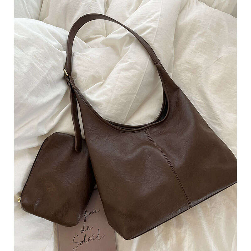 Marron banlieue bandoulière mère nouveau grande capacité Style coréen en cuir souple sous les bras sac à bandoulière unique pour les femmes