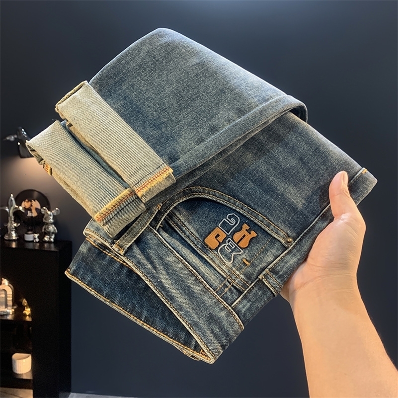 2025 retro washed blue tapered jeans for mens autumn trend versatile and casual slim fit small leg pants y250921